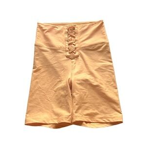 We wore what orange lace up biker shorts size small